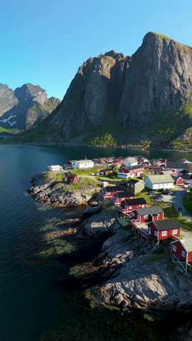 Discover the charming village of Reine in Norway, surrounded by stunning mountains and clear waters, ideal for nature lovers seeking unique Scandinavian beauty and adventure
