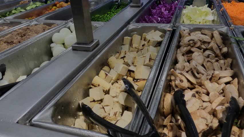 Big Selection of Organic Vegetables and Salads in Buffet Restaurant, Close Up