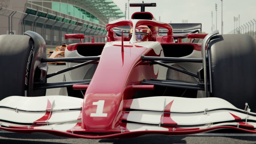 Camera pans along a generic race car in pole position with focus shift to other race cars. Front view. 3D animation rendering