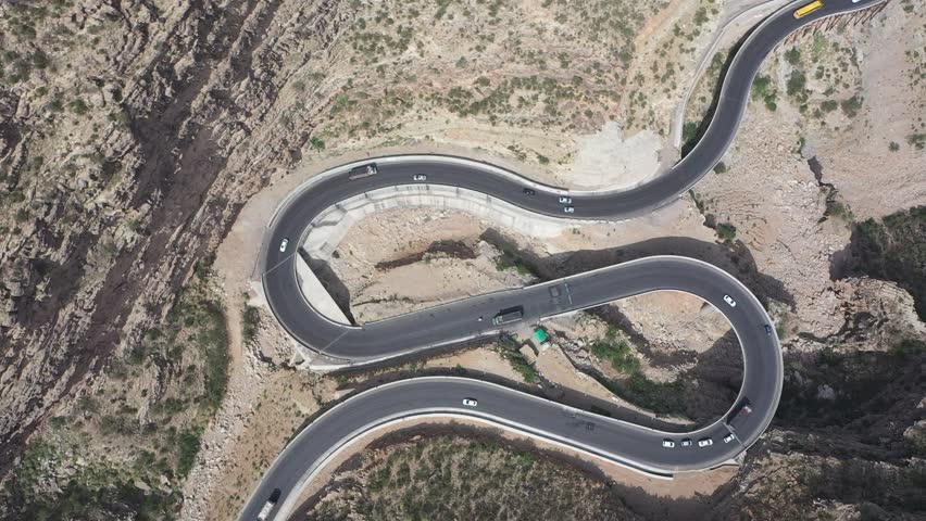 A serene aerial view of Fort Munro, highlighting its tranquil environment and the surrounding natural landscape.