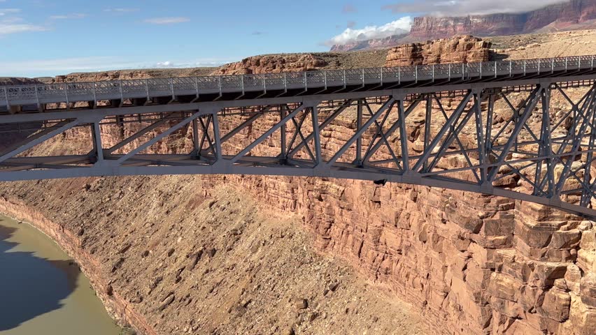 Slow Motion capture of a California Condor in flight through the majestic Marble Canyon in Arizona. The video captures the inspiring landscape of the canyon with a condor gliding effortlessly - USA