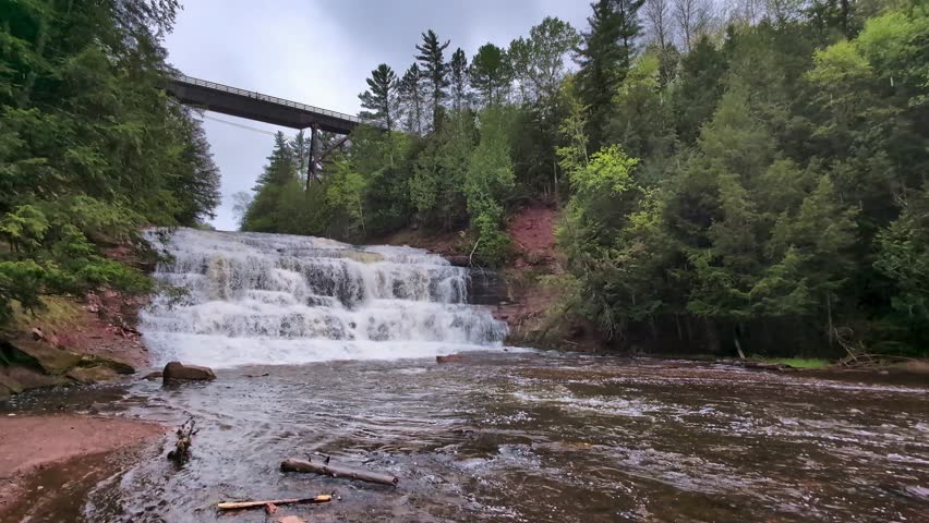 Old bridge spans the canyon above Agate Falls in the Upper Peninsula of Michigan