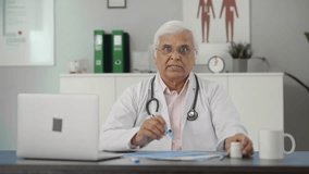 Angry Indian senior doctor explaining reports to the patient - Powered by Shutterstock - Get 15% off with code: PIKWIZARD15