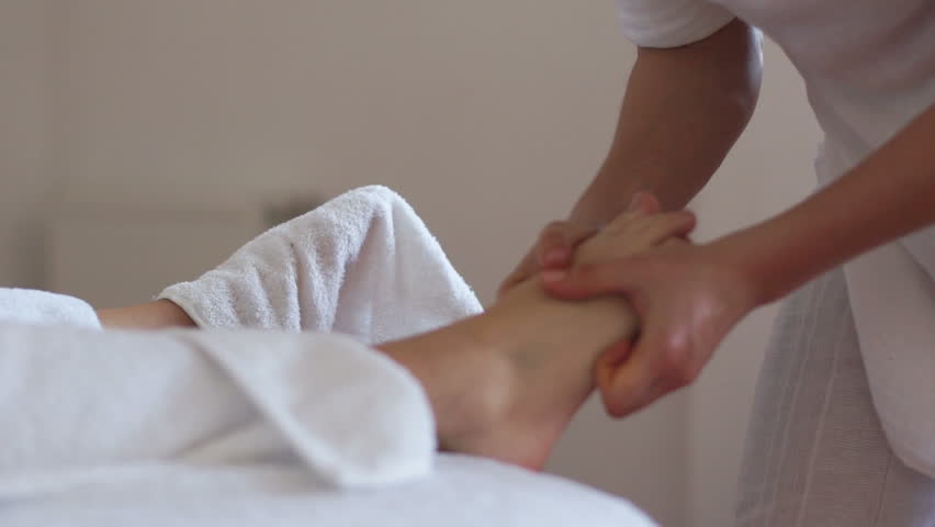 Feet massage in spa
