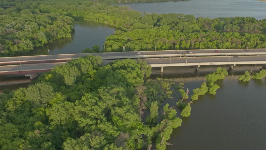 4K Side Scrolling East Aerial View Of 169 Bridge Over Minnesota River Savage MN