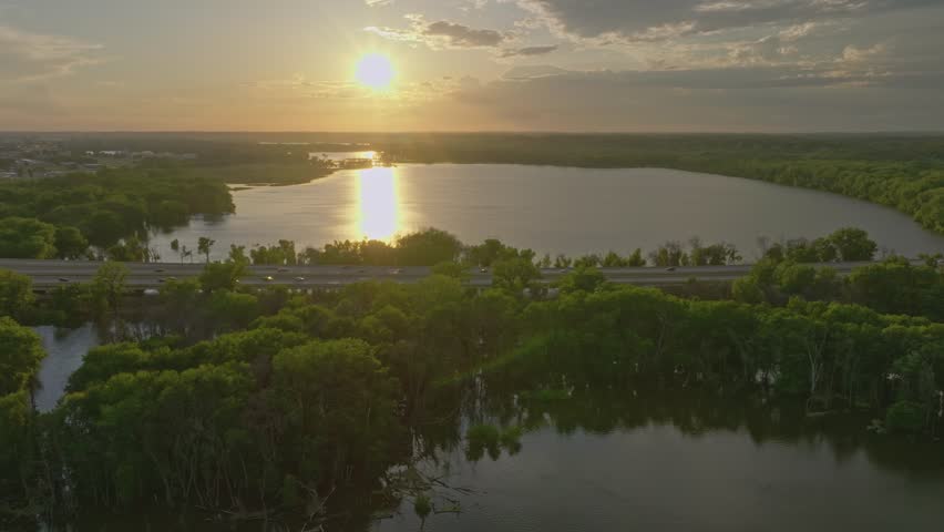 4K Wide Side Scrolling Drone Shot Of 169 Bridge Over Rice Lake Savage MN