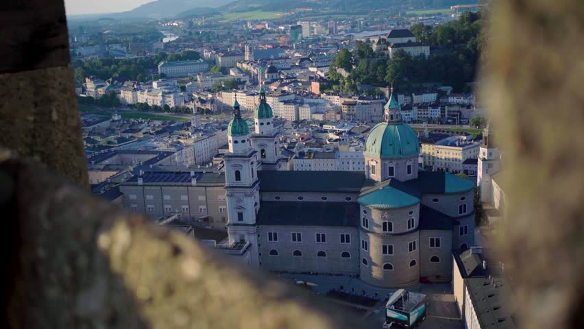 Salzburg city view with Cathedral at sunset from Castle