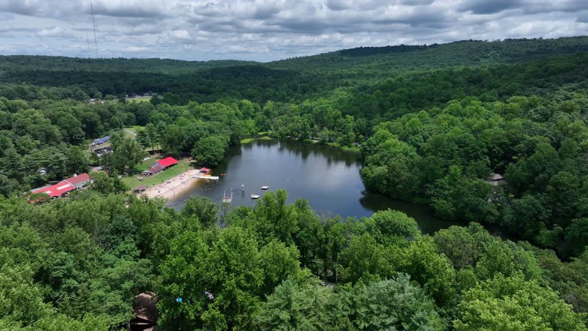Mt. Gretna Lake and Beach at Lake Conewago. Aerial establishing shot of popular summer swimming spot in Pennsylvania.