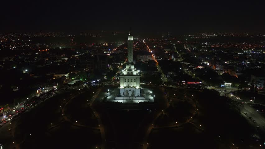 Panoramic aerial of illuminated Monument to the Heroes in Santiago de los Caballeros, Dominican Republic