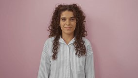 Brunette woman smiling against a pink background, highlighting a cheerful and bright mood. - Powered by Shutterstock - Get 15% off with code: PIKWIZARD15