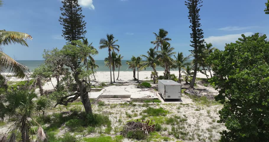 Droning through pine trees at Ft Myers Beach Florida