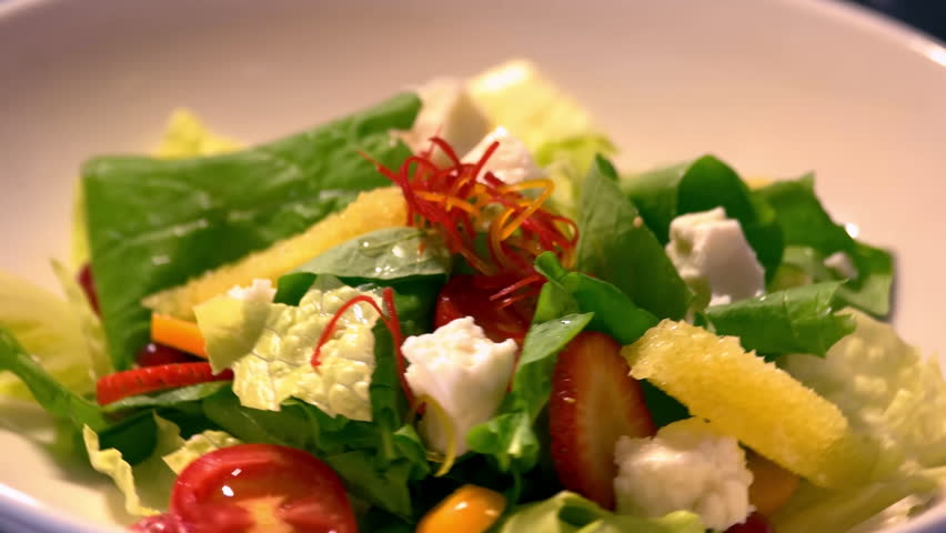 Fruits and Veggies Salad Close Up 4K Stock Footage - Fresh Healthy Ingredients, Vibrant Colors, Nutrient-Rich, Natural Food, High-Definition, Clean Eating, Healthy Lifestyle, Organic Produce