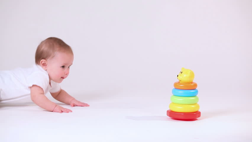 Baby play with pyramid