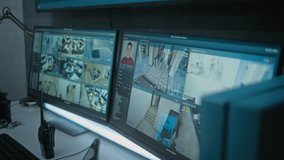 Surveillance video footage from the office CCTV cameras with face recognition system displayed on computer monitors in dark monitoring service center. Workplace for security operator or safeguard. - Powered by Shutterstock - Get 15% off with code: PIKWIZARD15