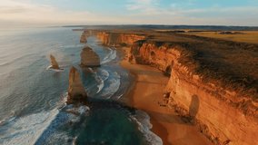 The rock stacks that comprise the Twelve Apostles at sunset in Port Campbell National Park, aerial view in slow motion. - Powered by Shutterstock - Get 15% off with code: PIKWIZARD15