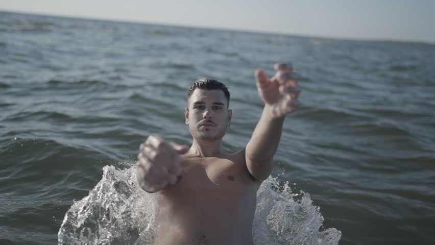 Man falls into water in slow motion