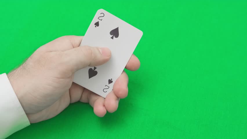 playing cards with poker combination straight from two to six in hands of man, slow motion
