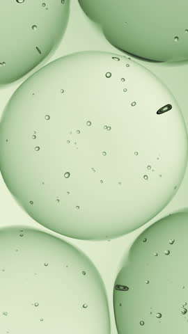 Cosmetics green serum liquid bubbles 3d abstract background. Cosmetic moisturizer essence gel. Collagen fluid bubble molecule. Moisturizing cream or oil. Personal health care and beauty skin concept
