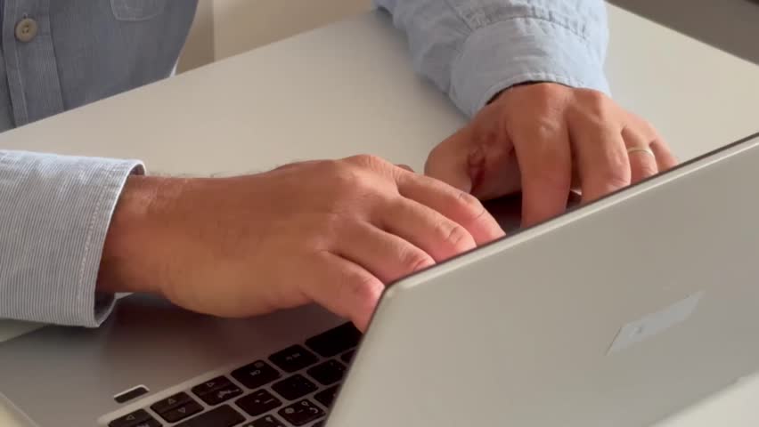 Close up casual businessman typing on laptop keyboard, preparing electronic report, web surfing information, doing marketing data research or communicating with client online, sitting at desk. - Powered by Shutterstock - Get 15% off with code: PIKWIZARD15
