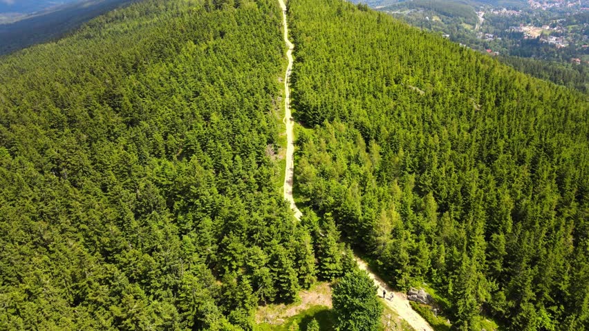 A tall stone located above Szklarska Poreba in the Jizera Mountains, view from a drone