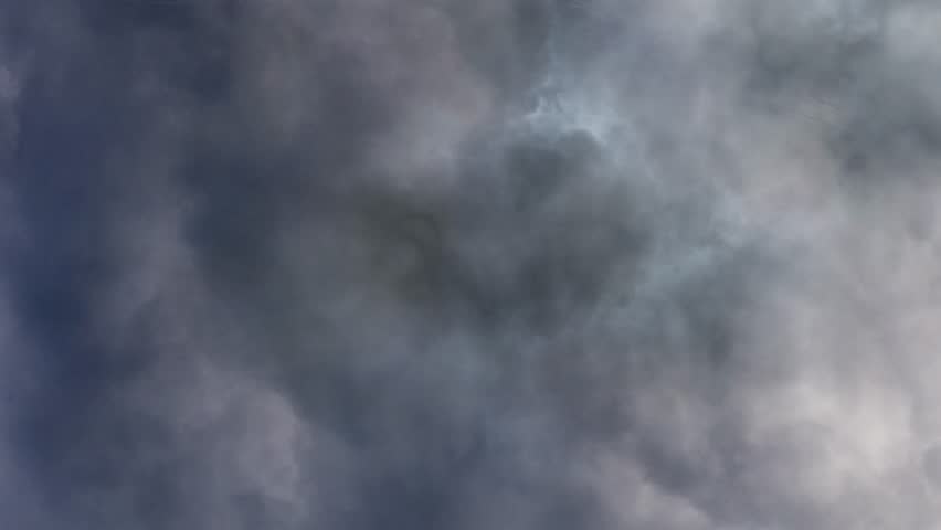 Bright dramatic lightening stretched across the night sky 4k