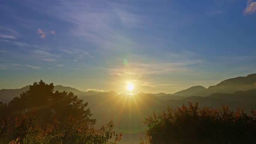 Sun over the mountain after the sunrise in Taiwan