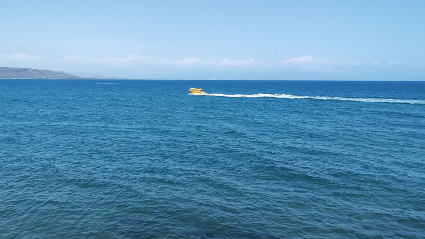 Aerial panorama on blue sea, coast and cape, Crete, Greece. Seashore sunset panorama, curved shoreline. High quality 4k footage