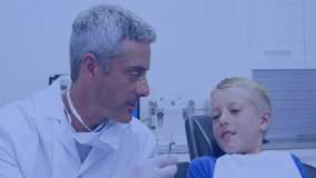 Medical network animation over dentist examining young boy in clinic. Healthcare, dentistry, pediatric, examination, technology, digital - Powered by Shutterstock - Get 15% off with code: PIKWIZARD15