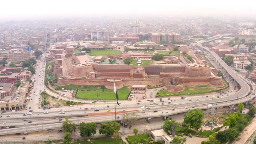 Peshawar, Pakistan - 16 August 2024 : Fort Bala Hisar is one of the most historic places of Peshawar, Khyber Pakhtunkhwa, Pakistan waving the flag of Pakistan