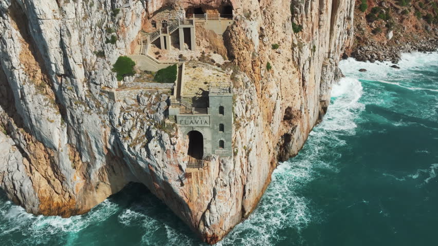 Aerial View of Porto Flavia: Historic Mining Port in Sardinia, Italy, Captured in Spring.