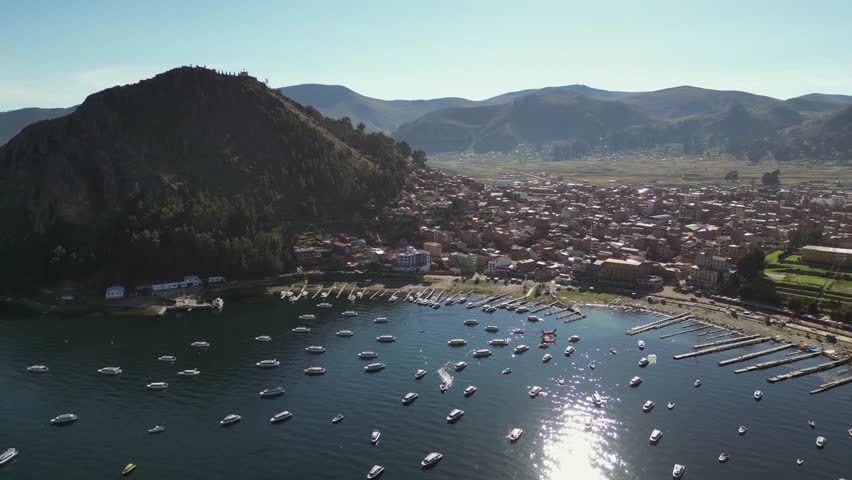 Aerial: High altitude city of Copacabana Bolivia on Lake Titicaca
