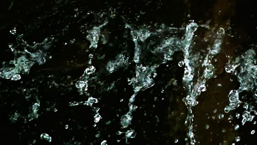 Water Splashes against a Black Background