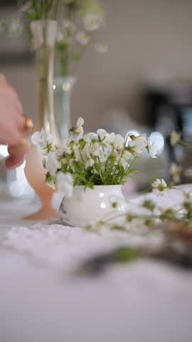 Delicate Floral Arrangement with Chamomile on Decorated Table