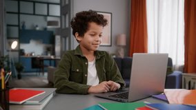 African American little son boy baby child kid smiling happy talking video call distant conference chat communicate friends virtual teacher online tutor studying e-learning at home education study - Powered by Shutterstock - Get 15% off with code: PIKWIZARD15