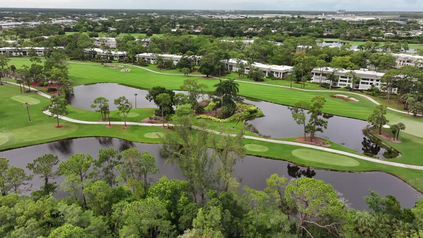 Florida country club golf course. Aerial establishing shot.