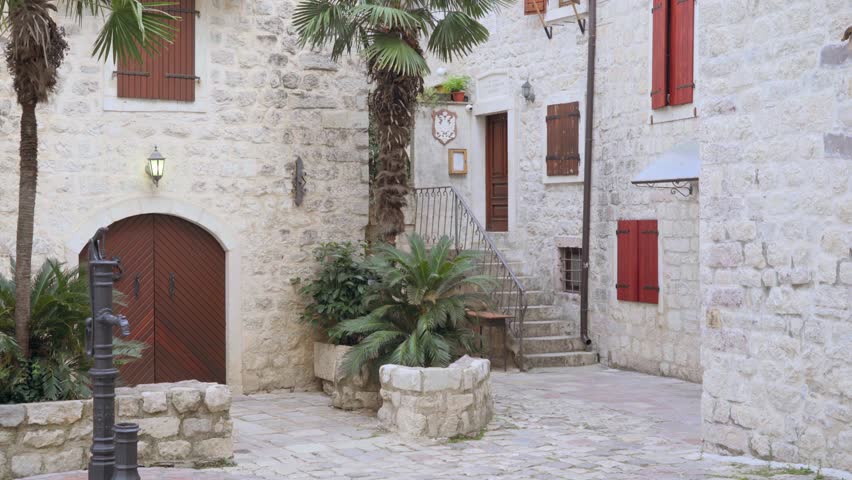 Kotor, Montenegro - July 10, 2024. View of the inner courtyard of the house inside of the Kotor old city