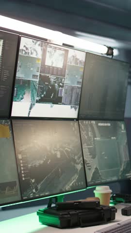 Vertical video Secure room in army governmental facility used for surveillance monitoring. Empty military base of operations with radar systems, tracking enemy aircraft entering airspace