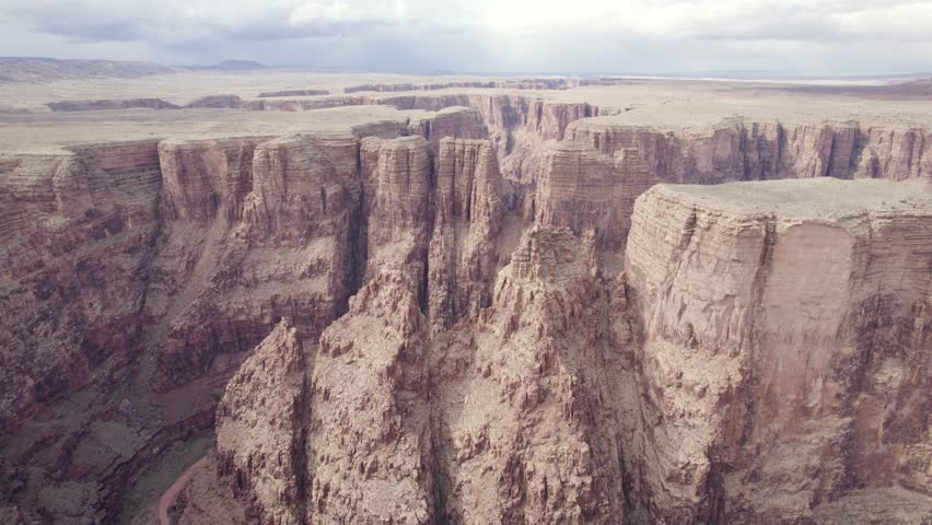 Steep Rugged Cliffs Of Grand Canyon In Arizona, USA. wide aerial shot