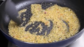 Stir Fry Garlic and Onion in A Pan, Cooking Backstage  - Powered by Shutterstock - Get 15% off with code: PIKWIZARD15