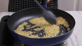 Stir Fry Garlic and Onion in A Pan, Cooking Backstage  - Powered by Shutterstock - Get 15% off with code: PIKWIZARD15