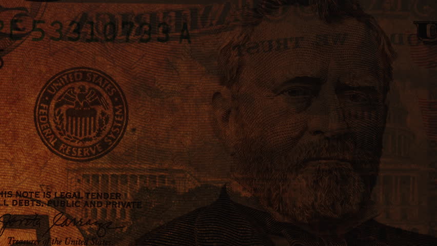 Review Of A Fifty-Dollar Bill Macro Slider, With Warm Light Shining Through It Checking Authenticity.