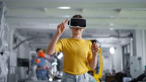 Video of schoolgirl with VR headset on head. Children learning robotics in Elementary school, using modern technology, virtual reality. - Powered by Shutterstock - Get 15% off with code: PIKWIZARD15