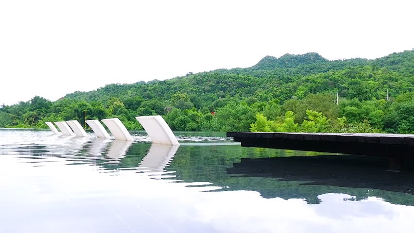 Swimming pool view with mountain background.