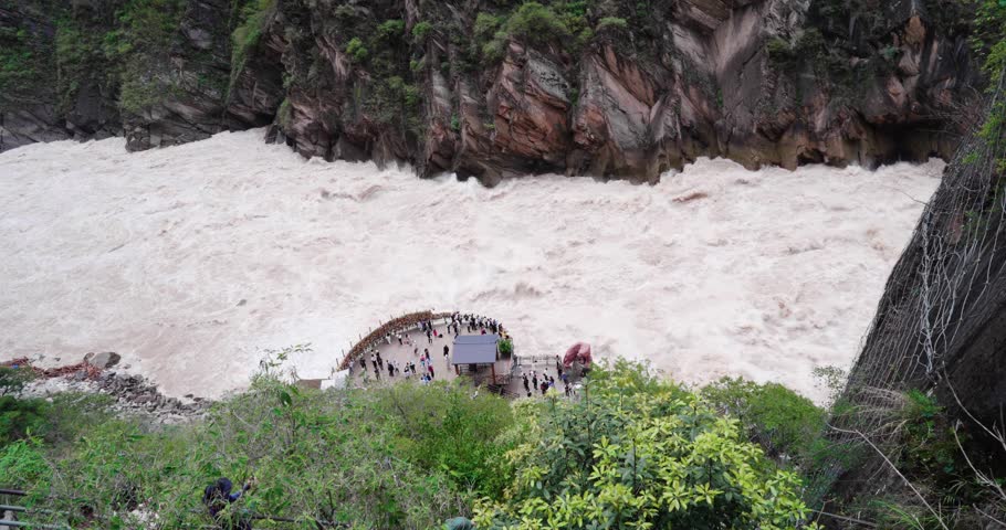 Tiger Leaping Gorge 虎跳峡 Hǔ tiào xiá is a scenic canyon on the Jinsha River, a primary tributary of the upper Yangtze River. It is located 60 km (37 mi) north of Lijiang City of China