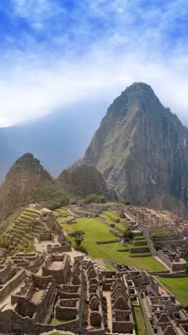Machu Picchu Through Ancient Stone Walls Vertical View