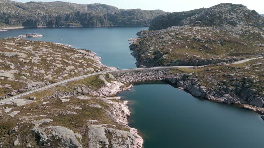 Beautiful nature with a road on sunny day in summer close to Lysebotn town in Norway