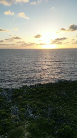 The Bluff rocky stone structure hill in Cayman Brac sister island of Grand Cayman from the Cayman Islands British Oversea territory in the West Indies surrounded by the Caribbean sea turquoise water