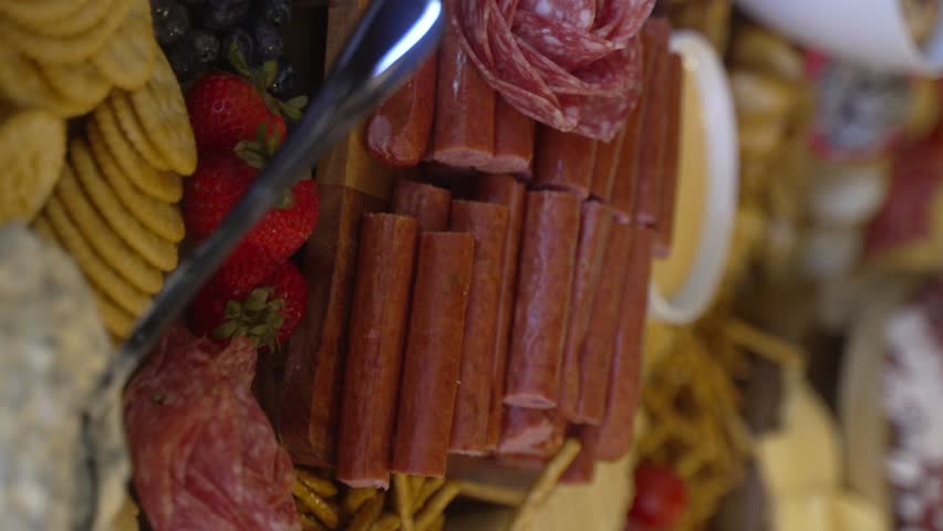 Charcuterie table layout at an event - close up vertical detail