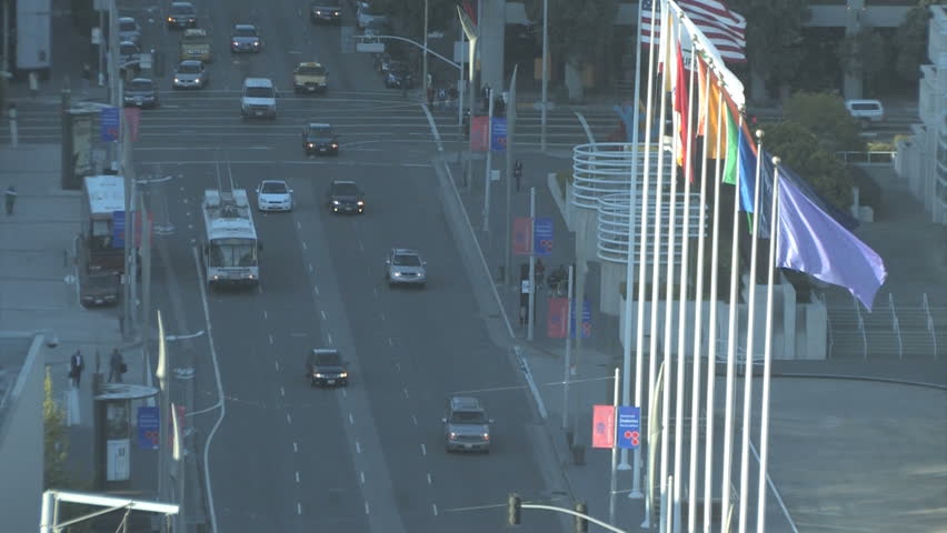SAN FRANCISCO, CA - JUNE 02: Aerial of a row of flags near a busy street on June