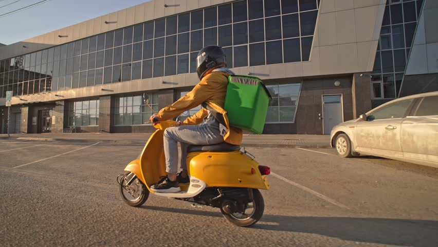 Courier man carry package moped. Guy ride scooter city street deliver box. Green backpack mock up. Fast food delivery service. Person drive bike thermal store bag. Express home order. Rush rider hurry